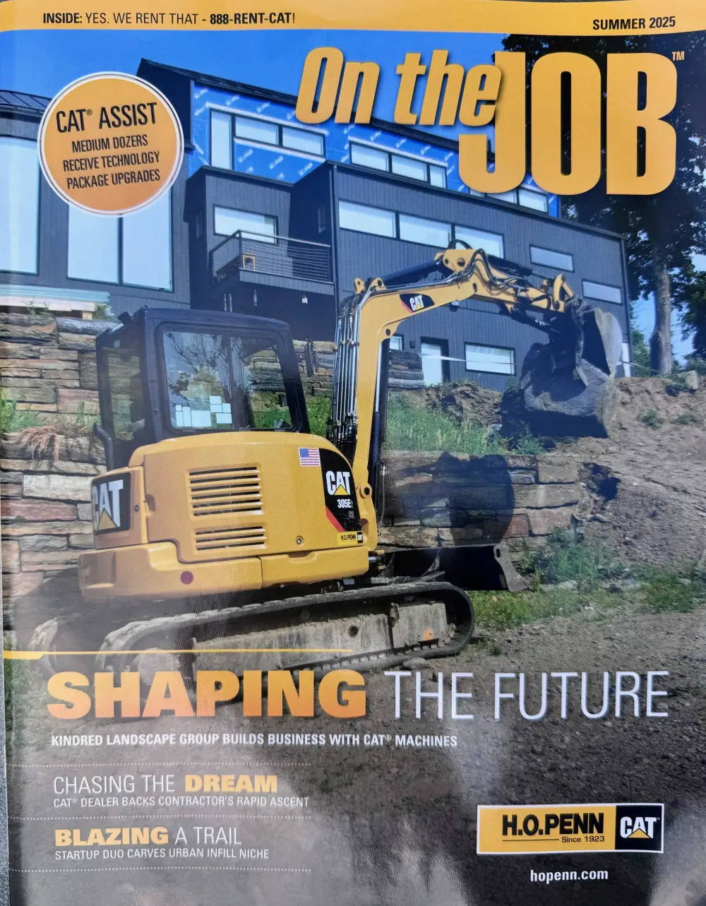 Contractor publication cover featuring Kindred Landscape Group and equipment-backed site work.